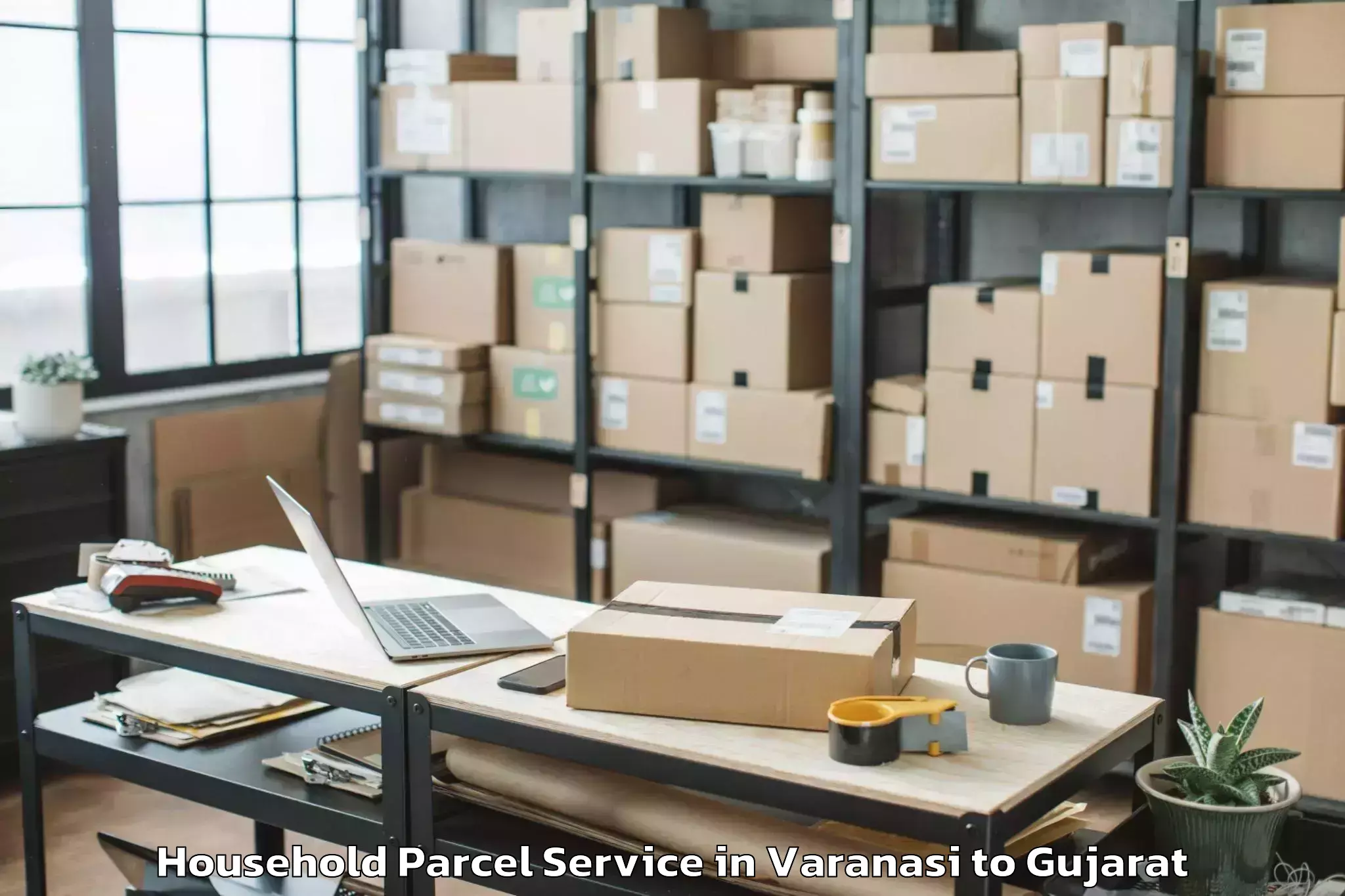 Book Varanasi to Khambhaliya Household Parcel Online